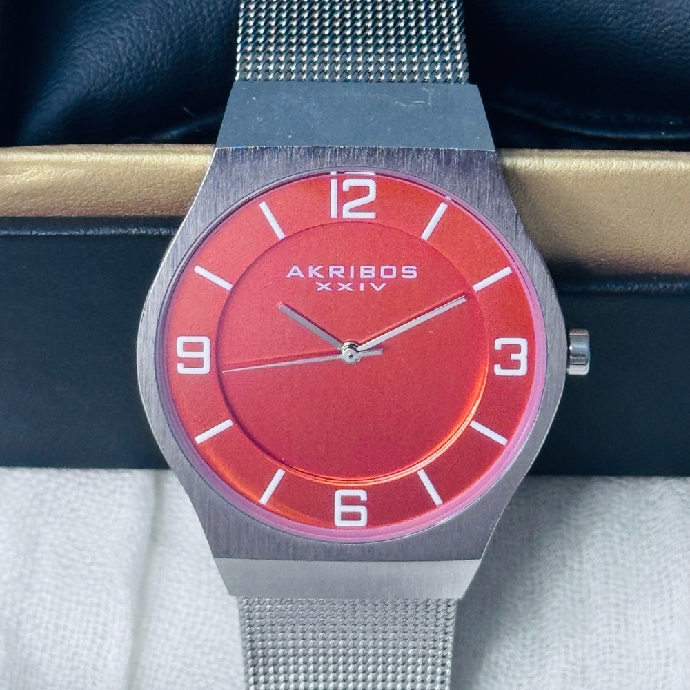 Akribos XXIV Orange Face Silver Mesh Watch